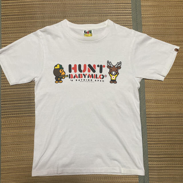 A BATHING APE(アベイシングエイプ)のAPE BAPE KAWS HUNT BABY MILO tシャツ s 白 メンズのトップス(Tシャツ/カットソー(半袖/袖なし))の商品写真