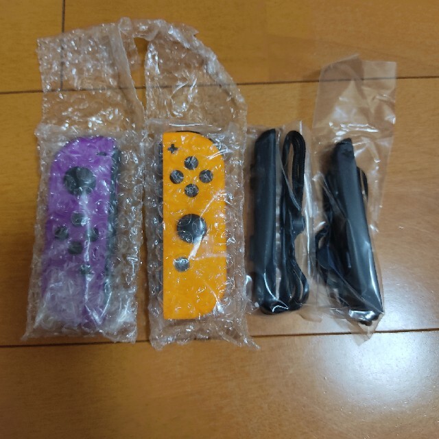 ★新品未使用★　ニンテンドースイッチ　ジョイコン　ネオンパープル　オレンジ エンタメ/ホビーのゲームソフト/ゲーム機本体(その他)の商品写真