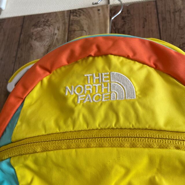 THE NORTH FACE(ザノースフェイス)のTHE NORTHFACE ノースフェイス　キッズ　リュックサック　イエロー　 キッズ/ベビー/マタニティのこども用バッグ(リュックサック)の商品写真