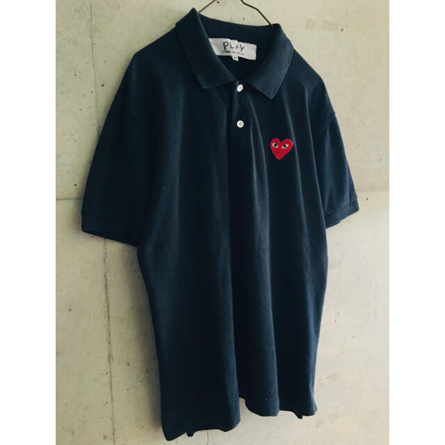 COMME des GARCONS(コムデギャルソン)の【★名作★正規★メンズM！】プレイコムデギャルソン 黒 予備ボタン付 ポロシャツ メンズのトップス(ポロシャツ)の商品写真