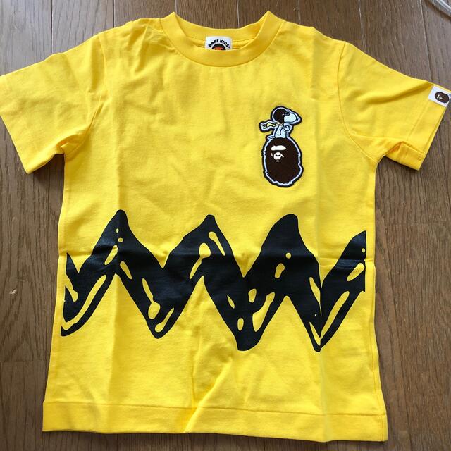 A BATHING APE(アベイシングエイプ)のBAPE KIDS × SNOOPY Tシャツ　120 キッズ/ベビー/マタニティのキッズ服男の子用(90cm~)(Tシャツ/カットソー)の商品写真