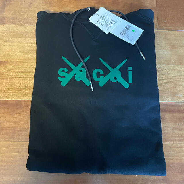 sacai KAWS Flock Hoodie Black/Green 2