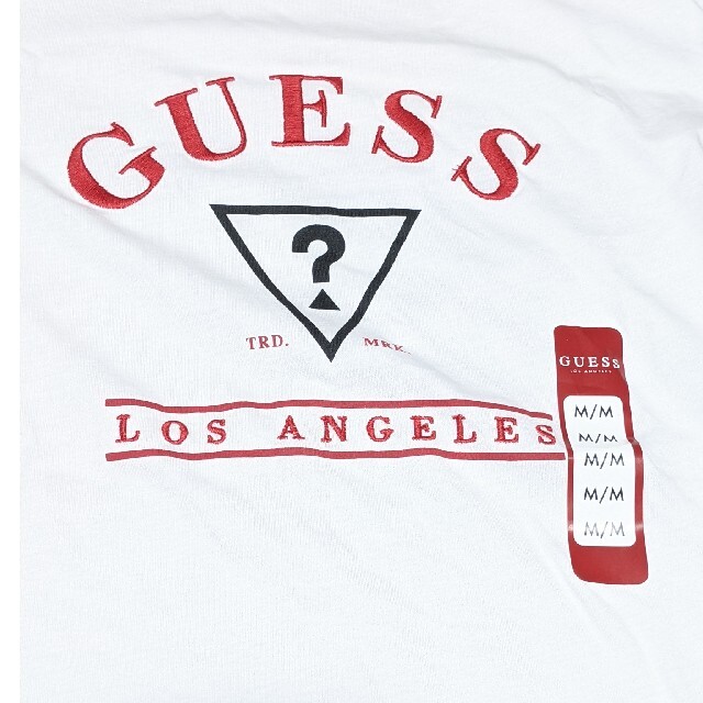 GUESS(ゲス)の【新品】GUESS ゲス V Tシャツ M ピュアホワイト タグ付 COLLER レディースのトップス(Tシャツ(半袖/袖なし))の商品写真