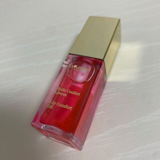 クラランス(CLARINS)のCLARINS コンフォート リップオイル 04 キャンディー(リップグロス)