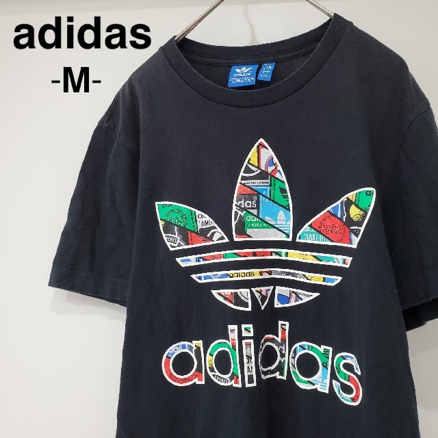 adidas(アディダス)のアディダス　オリジナルス　半袖Tシャツ　黒　ロゴマルチカラー　M　メンズ服　古着 メンズのトップス(Tシャツ/カットソー(半袖/袖なし))の商品写真