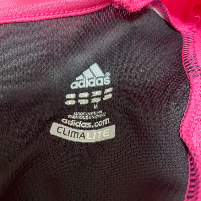 adidas(アディダス)の美品！adidas アディダス バッククロスTシャツ レディースのトップス(Tシャツ(長袖/七分))の商品写真