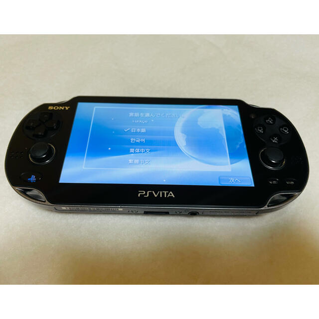 PlayStation Vita(プレイステーションヴィータ)のPS Vita PCH-1100 クリスタルブラック 動作確認済み  エンタメ/ホビーのゲームソフト/ゲーム機本体(家庭用ゲーム機本体)の商品写真