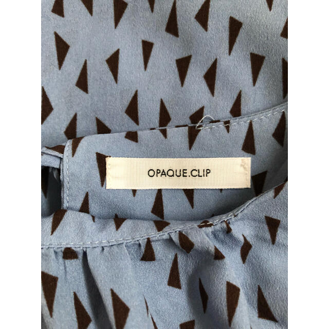 OPAQUE.CLIP(オペークドットクリップ)のブルー　バックリボン　ブラウス レディースのトップス(シャツ/ブラウス(半袖/袖なし))の商品写真