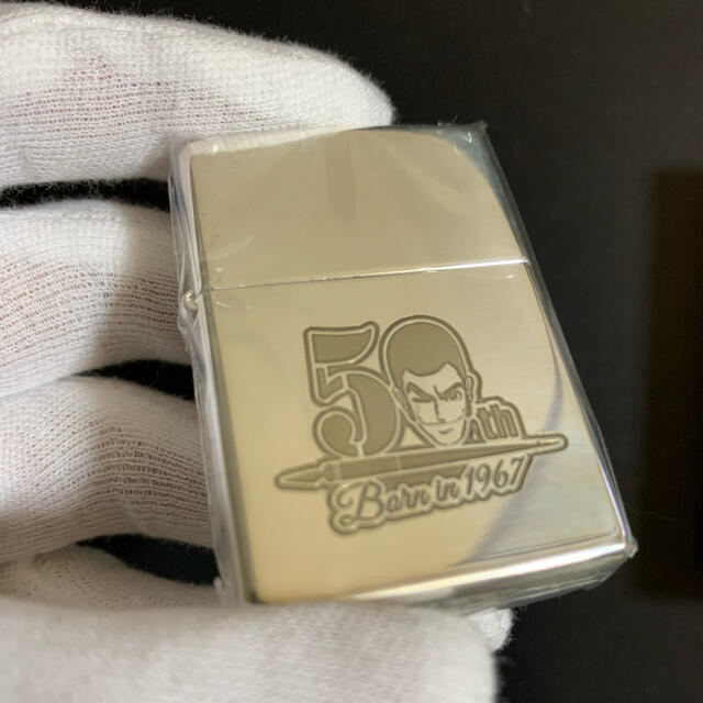 ZIPPO(ジッポー)の【新品未使用品】「ルパン三世」原作誕生50周年記念ZIPPOライター 記念ロゴ メンズのファッション小物(タバコグッズ)の商品写真