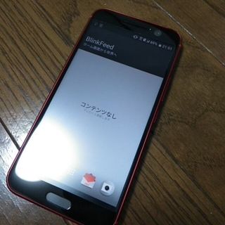 ハリウッドトレーディングカンパニー(HTC)のhtc htv32 32GB キャリアau(スマートフォン本体)