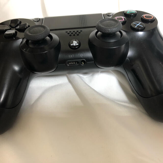 PlayStation4(プレイステーション4)の【完動品】DUALSHOCK4 ジェットブラック　中古美品 エンタメ/ホビーのゲームソフト/ゲーム機本体(家庭用ゲーム機本体)の商品写真