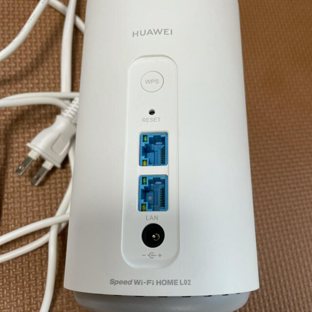 HUAWEI(ファーウェイ)のwimax Speed Wi-Fi HOME L02 ホワイト UQ au スマホ/家電/カメラのPC/タブレット(PC周辺機器)の商品写真