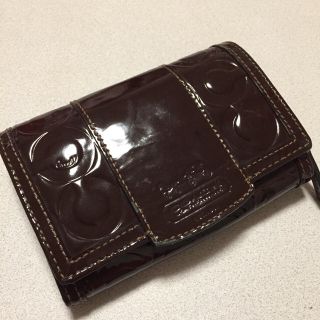 コーチ(COACH)のコーチのエナメル素材の二つ折り財布(財布)