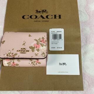 コーチ(COACH)のコーチ フローラルプリント 三つ折り財布 花柄　ピンク　#M59(財布)