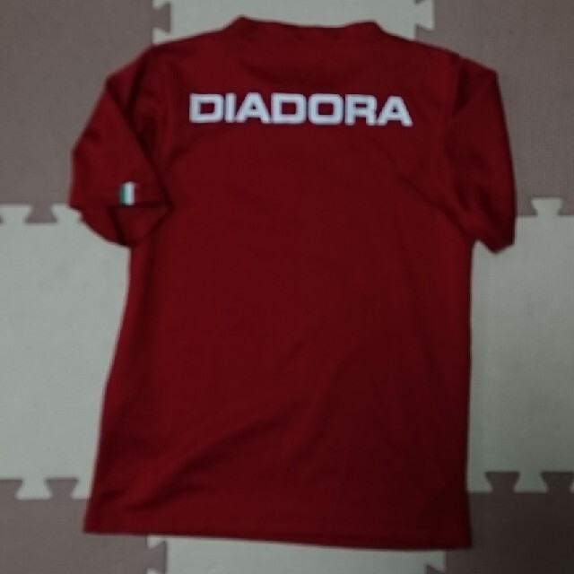 DIADORA(ディアドラ)の【ディアドラ】 Tシャツ 赤 おまけ付き  140cm キッズ/ベビー/マタニティのキッズ服男の子用(90cm~)(Tシャツ/カットソー)の商品写真