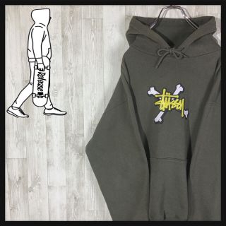 ステューシー(STUSSY)の【クロスボーン】ステューシー カーキ 人気 プルオーバー スウェットパーカー(パーカー)