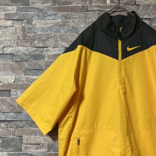 NIKE(ナイキ)のNIKE ナイキ ナイロンジャケット XL ゴルフ イエロー 半袖 メンズのジャケット/アウター(ナイロンジャケット)の商品写真