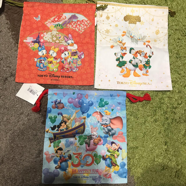 Disney(ディズニー)の最終値下げ！ディズニー巾着　5枚セット エンタメ/ホビーのおもちゃ/ぬいぐるみ(キャラクターグッズ)の商品写真