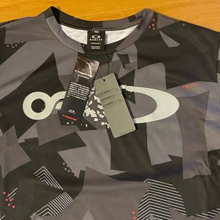 オークリー(Oakley)の値下げ‼️ オークリー グラフィックTシャツ、迷彩、XLサイズ(Tシャツ/カットソー(半袖/袖なし))