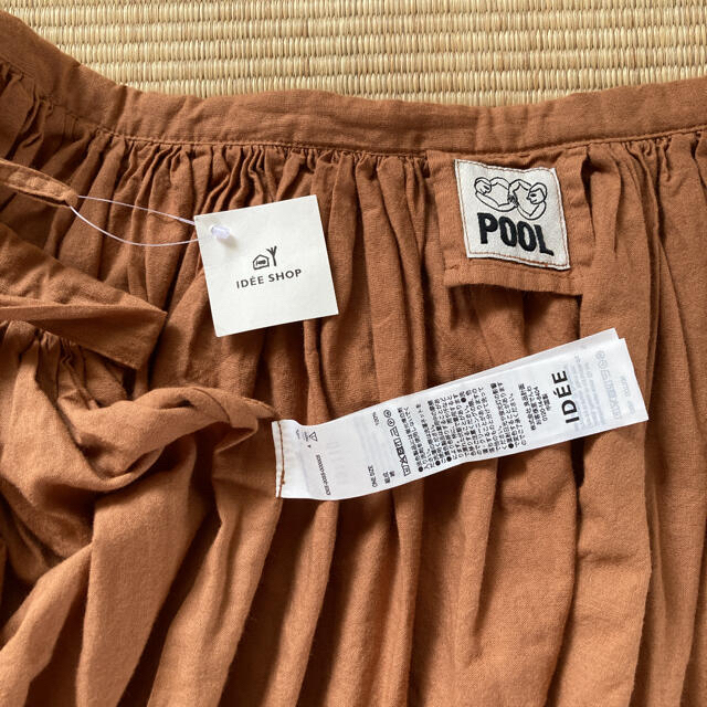 IDEE(イデー)のＰＯＯＬ　いろいろの服　ギャザーエプロン　巻きスカート レディースのスカート(ロングスカート)の商品写真