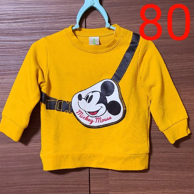 Disney(ディズニー)のディズニー ミッキー ボディバッグ風デザイン 長袖トレーナー イエロ キッズ/ベビー/マタニティのベビー服(~85cm)(トレーナー)の商品写真