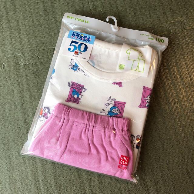 UNIQLO(ユニクロ)の新品ドラえもんパジャマ100 キッズ/ベビー/マタニティのキッズ服女の子用(90cm~)(パジャマ)の商品写真