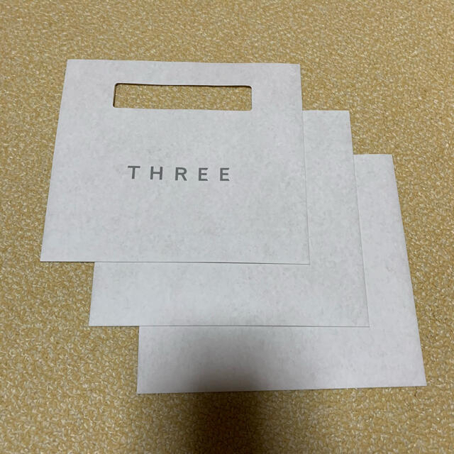 THREE(スリー)のTHREE スリー　紙袋　×3 （1枚から販売） レディースのバッグ(ショップ袋)の商品写真