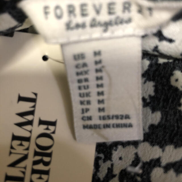 FOREVER 21(フォーエバートゥエンティーワン)の値下げしました　新品　オールインワン パンツ　ブラック×ホワイト　M レディースのパンツ(オールインワン)の商品写真