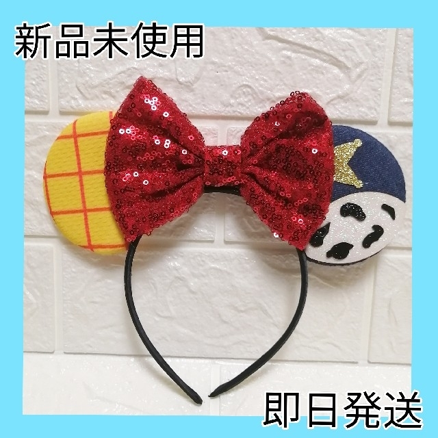 Disney(ディズニー)のディズニー　カチューシャ　トイストーリー　ピクサー　スパンコール　ハロウィン レディースのヘアアクセサリー(カチューシャ)の商品写真