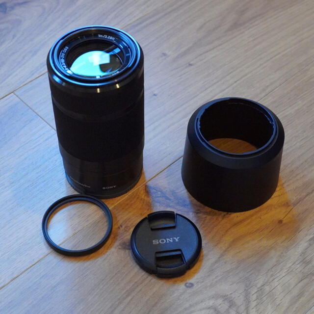 SONY(ソニー)のSEL55210 レンズプロテクター付き スマホ/家電/カメラのカメラ(レンズ(ズーム))の商品写真