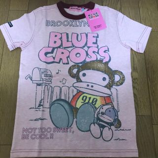 ナルミヤ インターナショナル(NARUMIYA INTERNATIONAL)のブルークロスＴシャツ　M（150）新品　タグ付き(Tシャツ/カットソー)