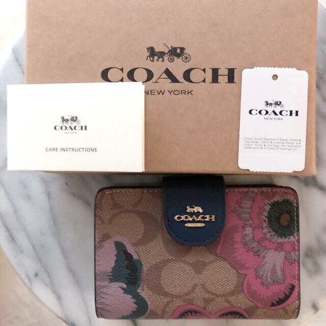 COACH(コーチ)の✨新作✨COACH✤シグネチャー✤二つ折り財布✤ 大きな花柄 レディースのファッション小物(財布)の商品写真