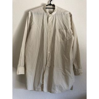 コモリ(COMOLI)のcomoli バンドカラーストライプ シャツ size 0 生成り(シャツ)