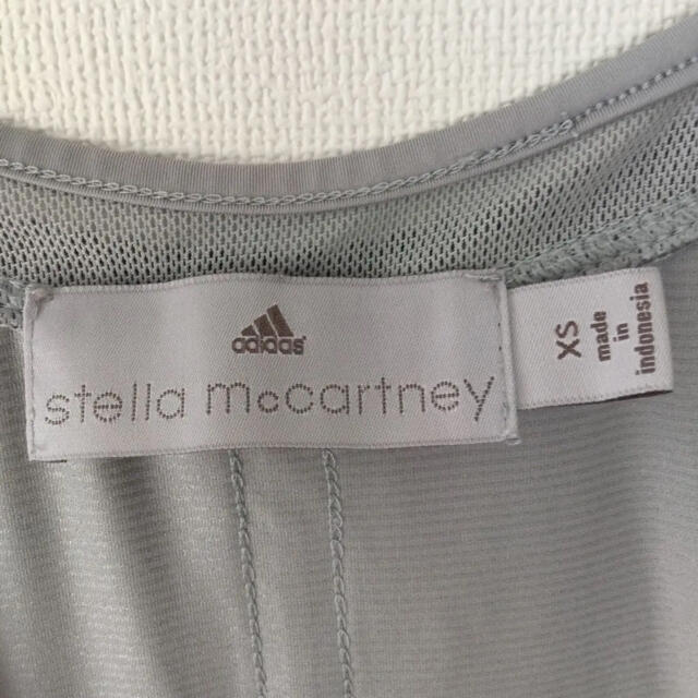 adidas by Stella McCartney(アディダスバイステラマッカートニー)のadidas by Stella McCartney タンクトップ ペールグレー スポーツ/アウトドアのランニング(ウェア)の商品写真