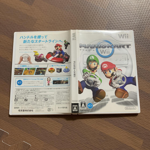 Wii(ウィー)のwii マリオカート　ソフト　ハンドル　セット エンタメ/ホビーのゲームソフト/ゲーム機本体(家庭用ゲームソフト)の商品写真