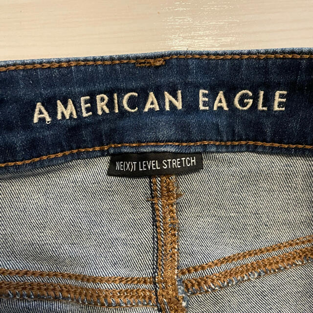 American Eagle(アメリカンイーグル)のアメリカンイーグル ダメージデニム スキニー(ネクストレベルストレッチ) レディースのパンツ(デニム/ジーンズ)の商品写真