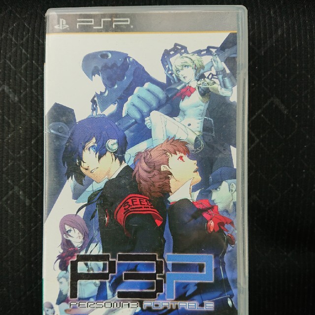 PlayStation Portable(プレイステーションポータブル)のP3P ペルソナ3ポータブル  ＋攻略本セット エンタメ/ホビーのゲームソフト/ゲーム機本体(携帯用ゲームソフト)の商品写真