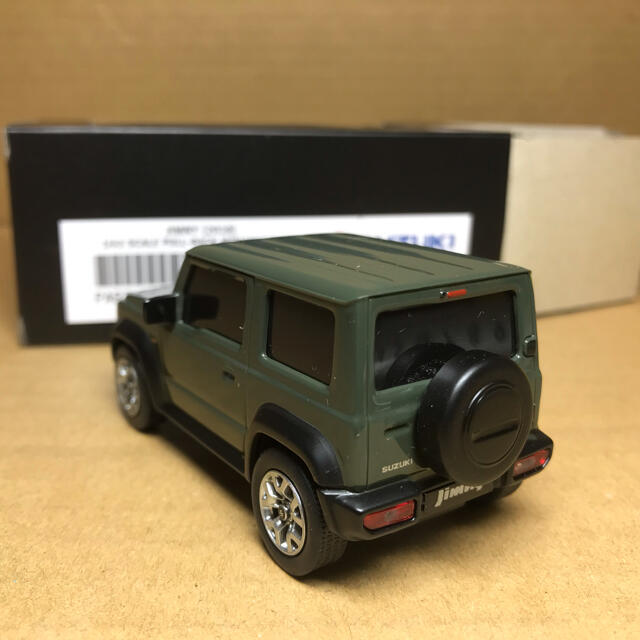 スズキ(スズキ)のスズキ純正　1/43 新型ジムニー　ジャングルグリーン　プルバックミニカー  エンタメ/ホビーのおもちゃ/ぬいぐるみ(ミニカー)の商品写真