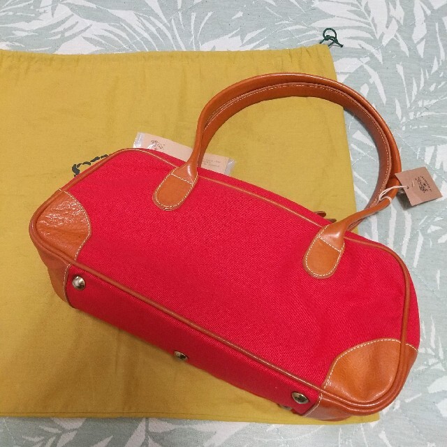 IL BISONTE(イルビゾンテ)の新品 イルビゾンテ キャンバス 布 本革 レザー バッグトートバッグ レッド レディースのバッグ(ハンドバッグ)の商品写真