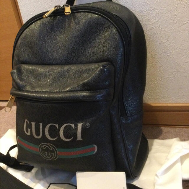 Gucci(グッチ)のGUCCI グッチ　プリント　レザー　バックパック　リュック　黒　美品 メンズのバッグ(バッグパック/リュック)の商品写真