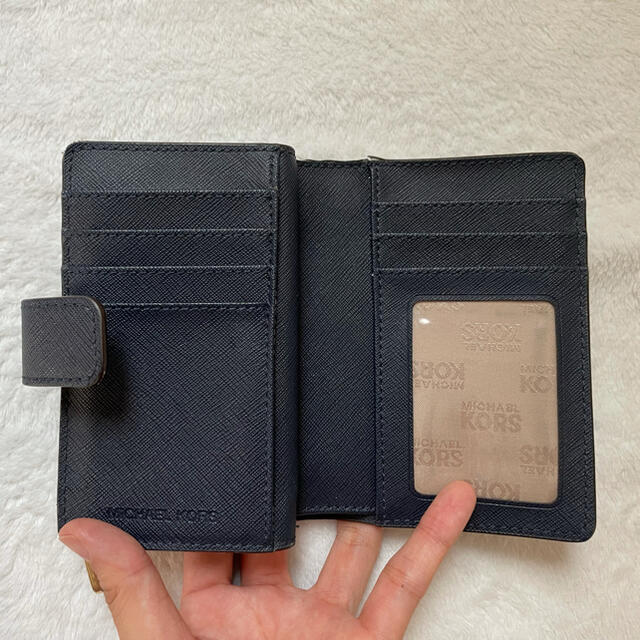 Michael Kors(マイケルコース)の未u様専用　MICHAEL KORSの折りたたみ財布 レディースのファッション小物(財布)の商品写真