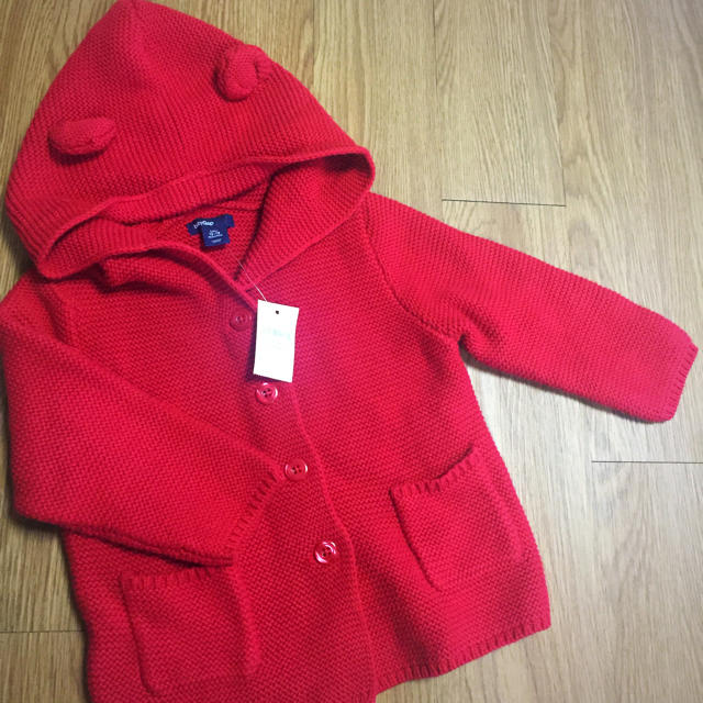 babyGAP(ベビーギャップ)のbabygap タグ付き ニットカーディガン キッズ/ベビー/マタニティのベビー服(~85cm)(ニット/セーター)の商品写真