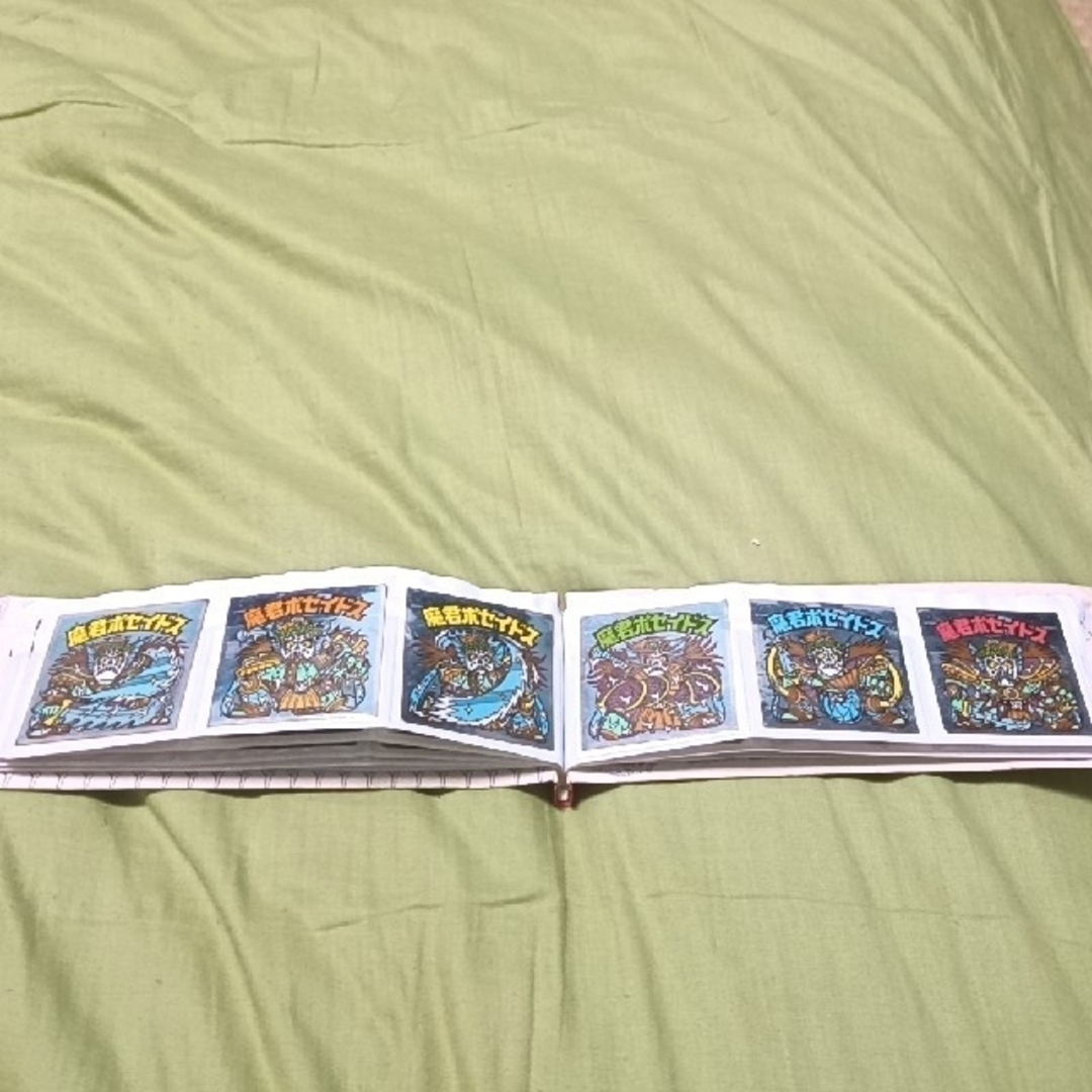 ビックリマンシール　ミニファイル付き　48枚 エンタメ/ホビーのトレーディングカード(カードサプライ/アクセサリ)の商品写真