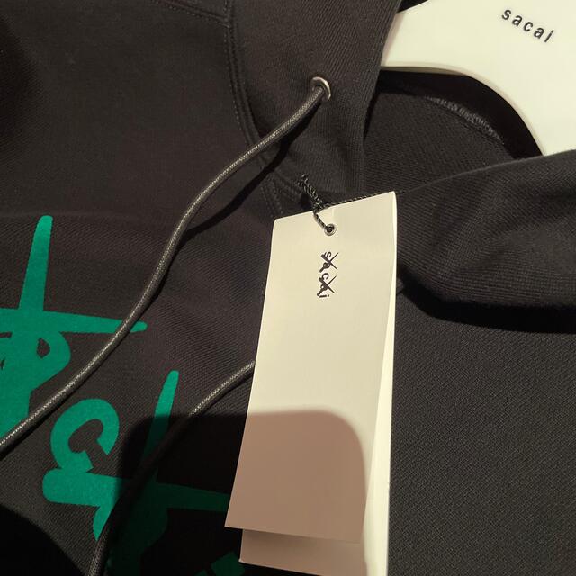 sacai KAWS Flock Hoodie Black/Green 2