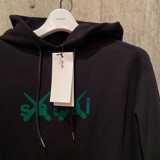 サカイ(sacai)の新品未使用品　sacai KAWS Flock Hoodie 3 L(パーカー)