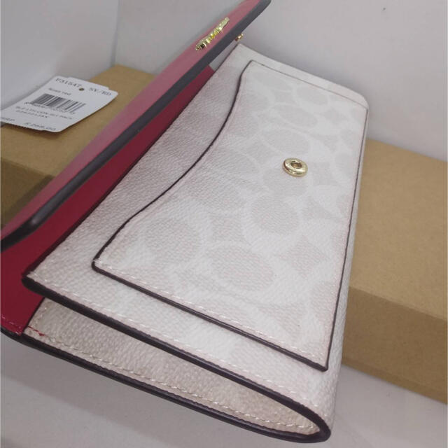 COACH(コーチ)のＣＯＡＣＨソフト長折財布可愛いピンク×ホワイトシグネスチャー新品 レディースのファッション小物(財布)の商品写真