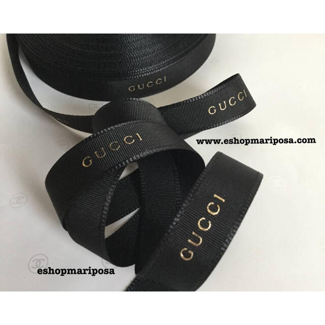 Gucci(グッチ)のグッチリボン🎀 2m 2種ブラック x ゴールド ストライプ ロゴ入り 黒金  インテリア/住まい/日用品のオフィス用品(ラッピング/包装)の商品写真