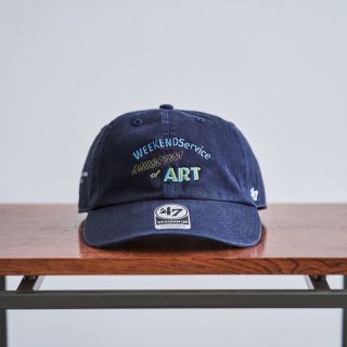 コモリ(COMOLI)のWEEKENDService Museum of ART cap(キャップ)