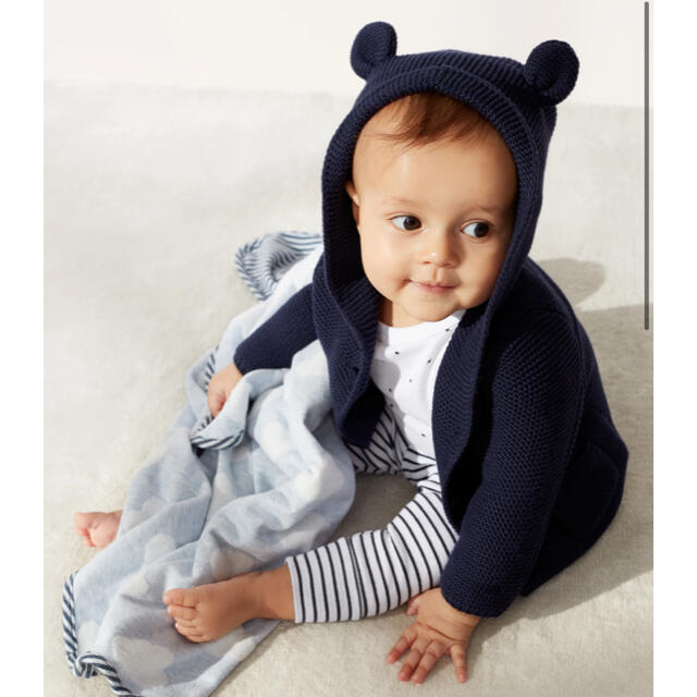 babyGAP(ベビーギャップ)のBABY GAP くま耳ニットカーディガンネイビー90アウター子供服 キッズ/ベビー/マタニティのキッズ服男の子用(90cm~)(カーディガン)の商品写真