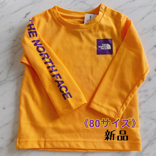 THE NORTH FACE(ザノースフェイス)の★ノースフェイスベビー スモールスクエアロゴTシャツ 80サイズ イエロー★新品 キッズ/ベビー/マタニティのベビー服(~85cm)(Ｔシャツ)の商品写真